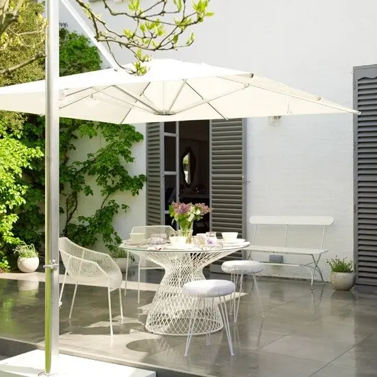 white-wire-work-garden-dining-homes-and-gardens-housetohome